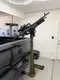 Belt-fed machine gun on a pedestal mount