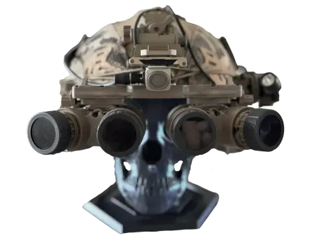 Quad-tube night vision goggles mounted on a ballistic helmet